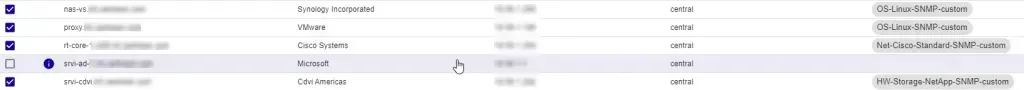 Nmap discovery results in Centreon: discovered hosts with vendor (Synology, VMware, Cisco, Microsoft) and proposed templates, one host lacking a template
